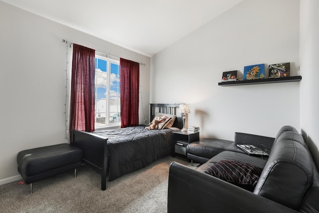 carpeted bedroom featuring vaulted ceiling