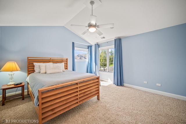 bedroom featuring lofted ceiling, ceiling fan, baseboards, and carpet flooring