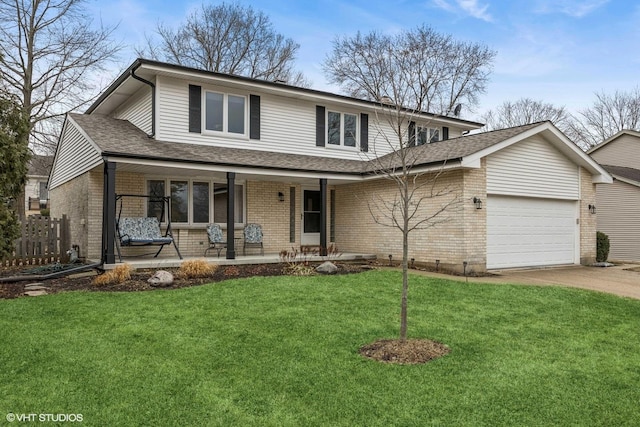 traditional home featuring an attached garage, covered porch, brick siding, concrete driveway, and a front yard