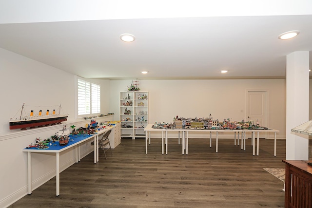 game room featuring dark wood finished floors and recessed lighting