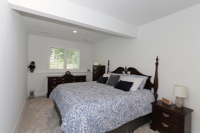 bedroom featuring light carpet, recessed lighting, and baseboards