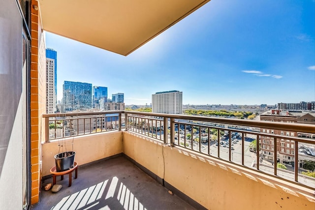 balcony featuring a city view