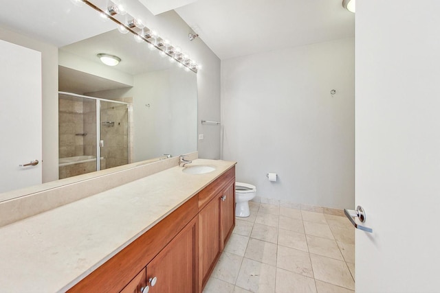 full bath with a bathtub, toilet, a tile shower, vanity, and tile patterned floors