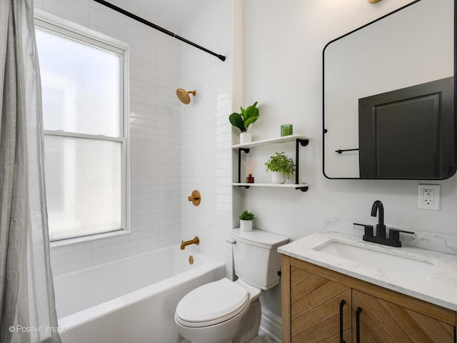 full bath with toilet, shower / bathtub combination, and vanity