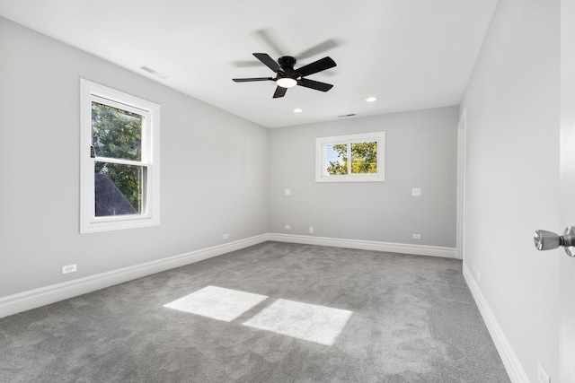 carpeted empty room with recessed lighting, baseboards, visible vents, and ceiling fan