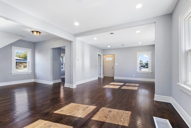 entryway featuring recessed lighting, wood finished floors, visible vents, and baseboards