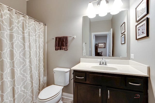 full bath with toilet, vanity, and a shower with shower curtain