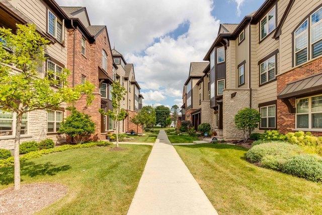 surrounding community featuring a residential view and a lawn