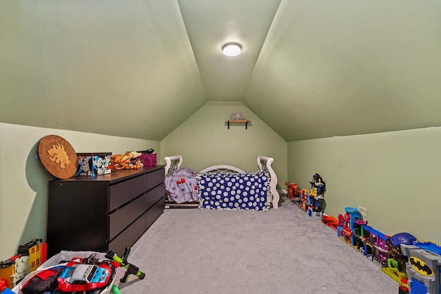 recreation room featuring lofted ceiling and carpet flooring