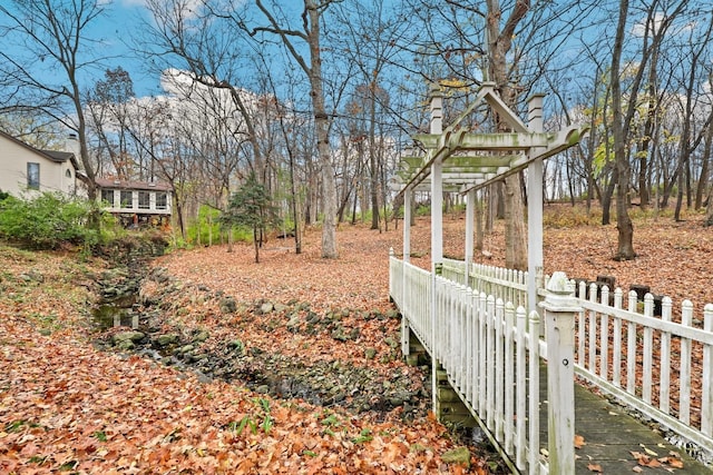 view of yard featuring fence