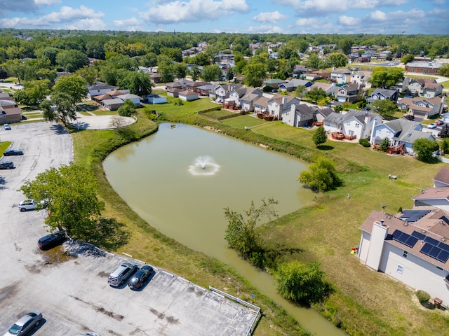 aerial view with a residential view and a water view