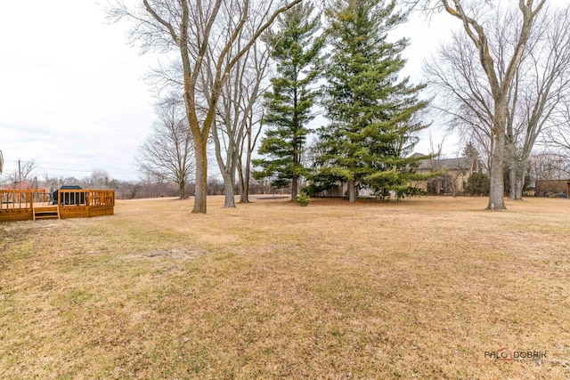 view of yard with a deck