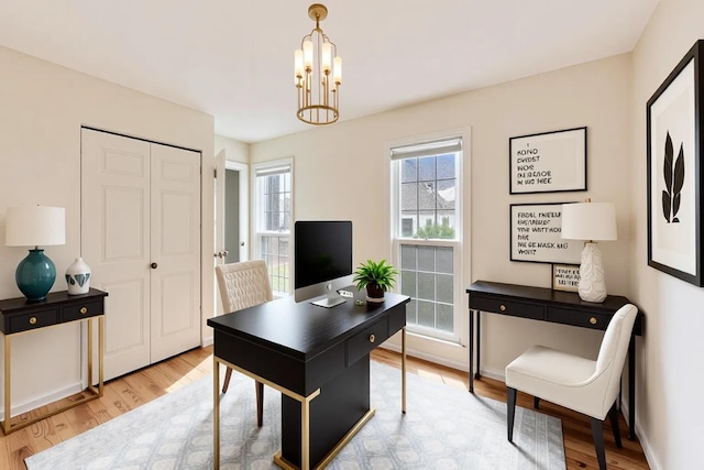 6 Robin Hood Ct, Lincolnshire, IL 60069 - office with baseboards, light wood-style floors, and a chandelier
