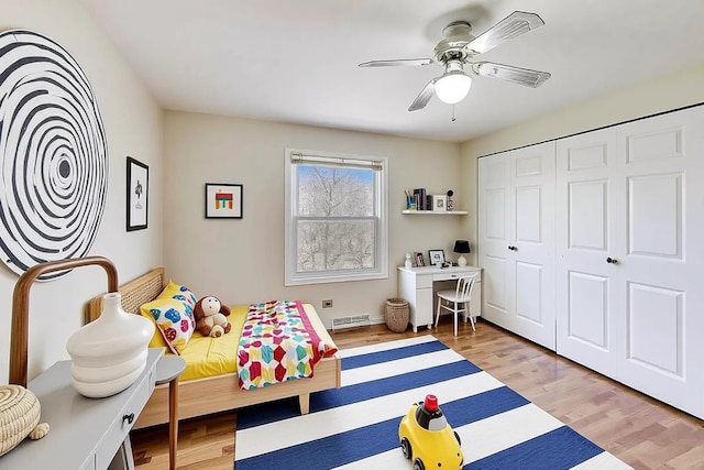 6 Robin Hood Ct, Lincolnshire, IL 60069 - bedroom with light wood finished floors, a closet, and ceiling fan