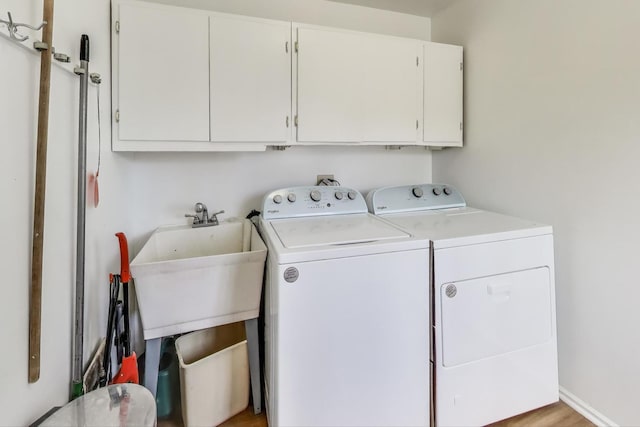 6 Robin Hood Ct, Lincolnshire, IL 60069 - laundry area featuring cabinet space and washing machine and clothes dryer