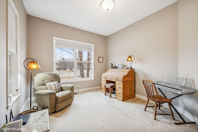 office with light carpet and baseboards