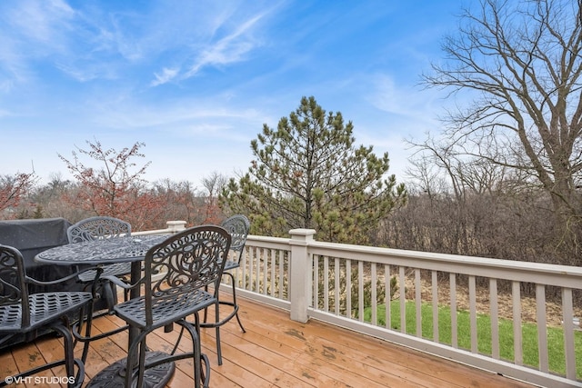 deck featuring outdoor dining space