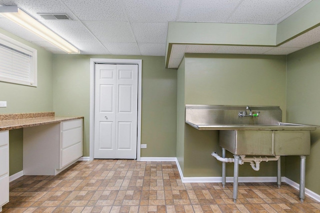 interior space featuring visible vents and baseboards