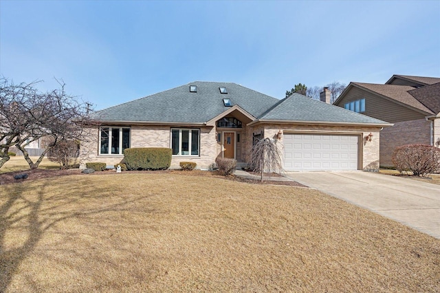 single story home featuring a shingled roof, concrete driveway, an attached garage, a front lawn, and brick siding