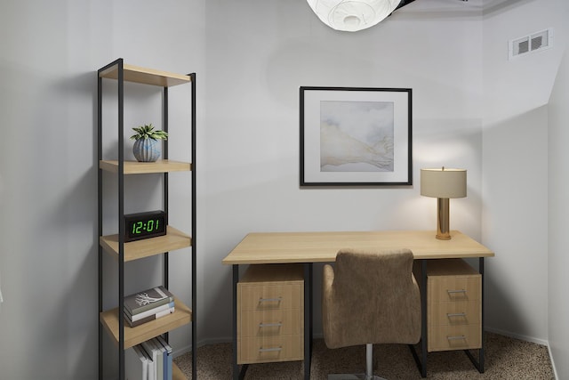 home office with carpet floors, baseboards, and visible vents