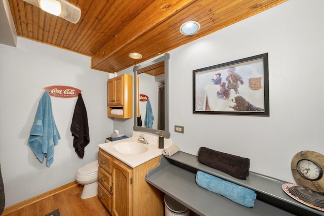 bathroom featuring vanity, a shower with curtain, wood finished floors, wood ceiling, and toilet