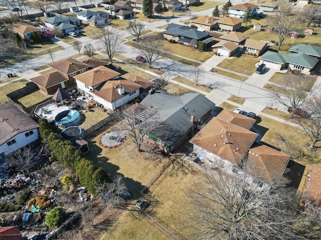 birds eye view of property with a residential view