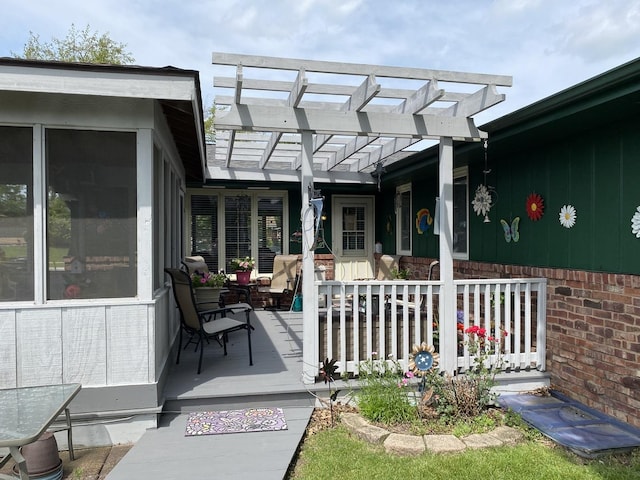 doorway to property with a pergola