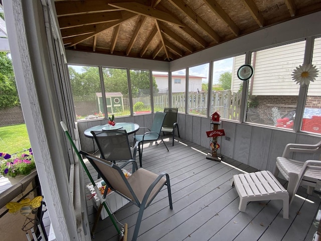 sunroom / solarium with lofted ceiling