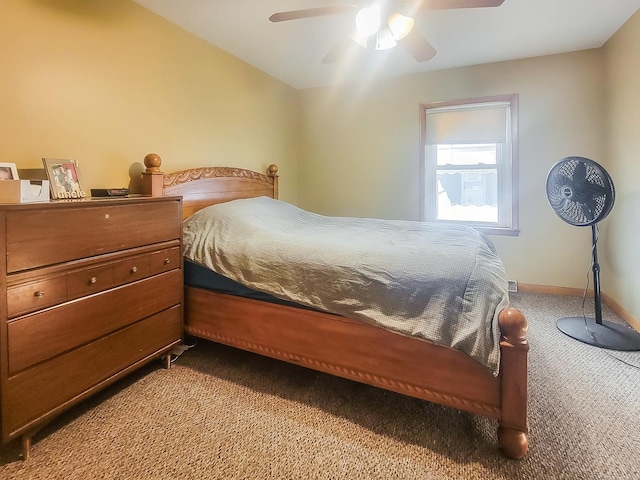 bedroom featuring carpet floors, ceiling fan, and baseboards