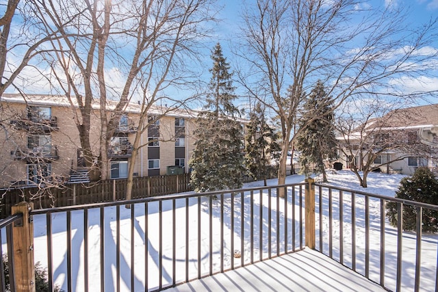 view of snow covered deck