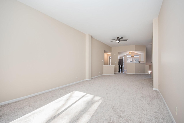 unfurnished bedroom with a ceiling fan, carpet flooring, and baseboards