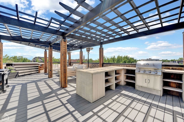 deck featuring an outdoor hangout area, grilling area, and a pergola