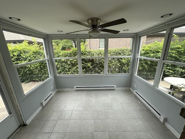 unfurnished sunroom with a baseboard heating unit, a baseboard radiator, and a ceiling fan