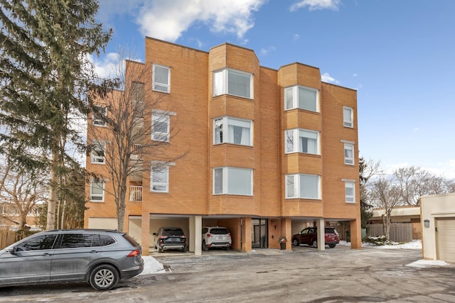 view of property with covered parking