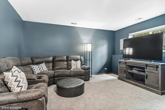 living room featuring carpet flooring, baseboards, and visible vents