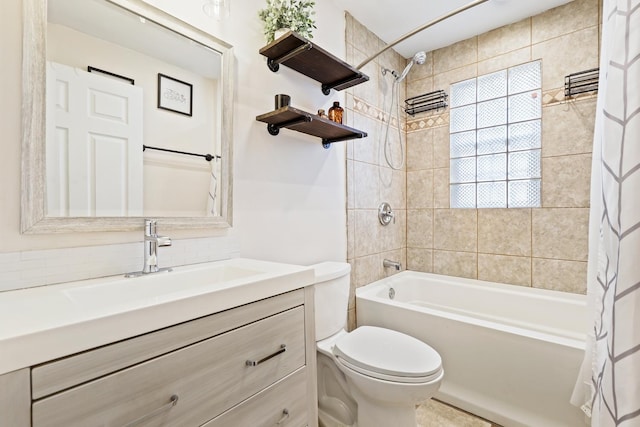 full bathroom with toilet, tasteful backsplash, shower / bath combo with shower curtain, and vanity