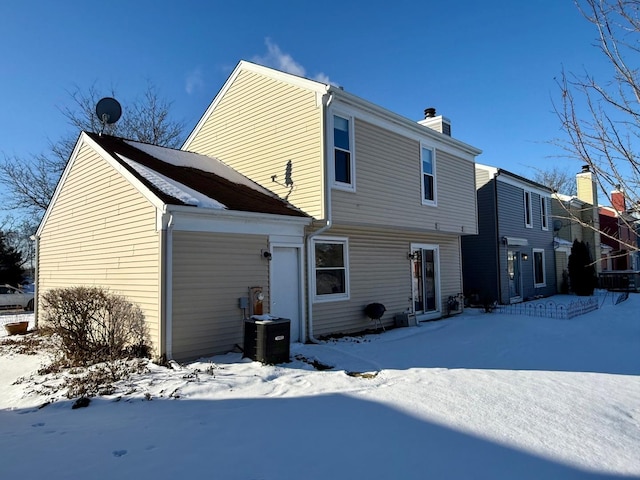 view of snow covered property