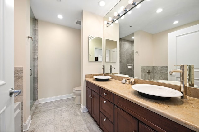 full bath featuring a sink, tiled shower, and marble finish floor