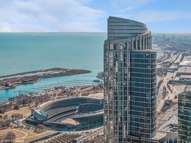 view of urban area featuring a nearby body of water