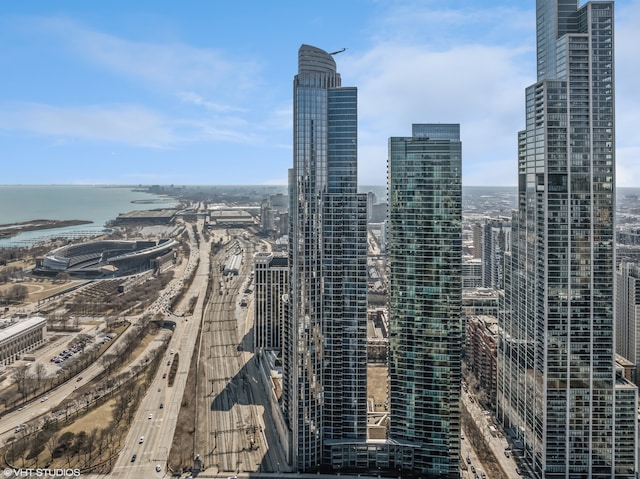 property's view of city with a water view