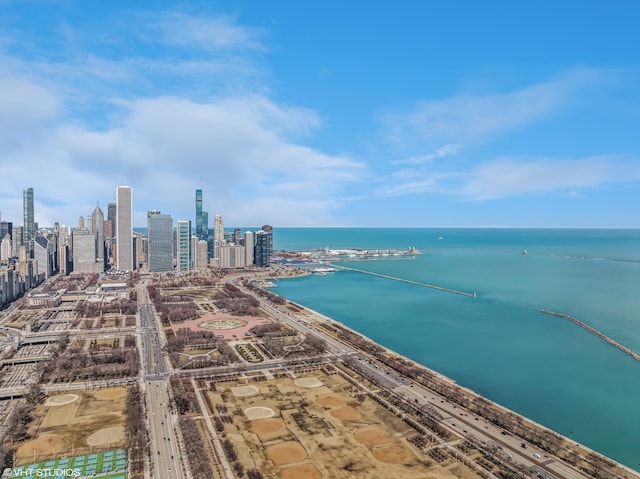 aerial view featuring a view of city and a water view