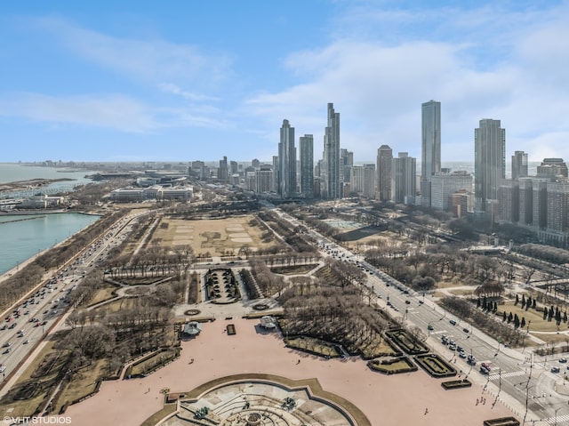 aerial view with a city view and a water view