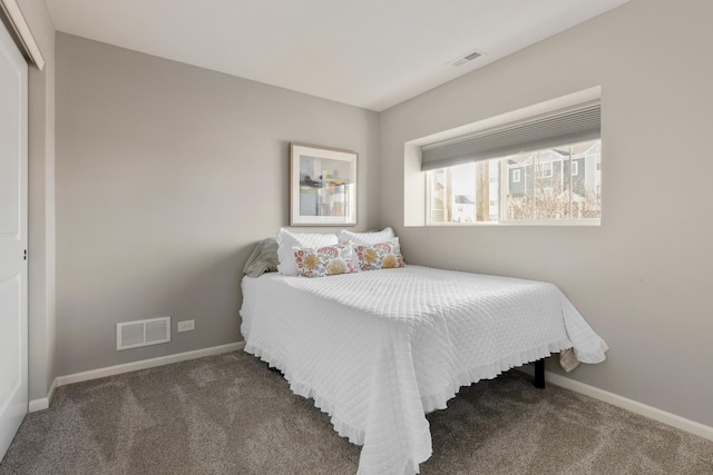 bedroom featuring carpet flooring, baseboards, and visible vents