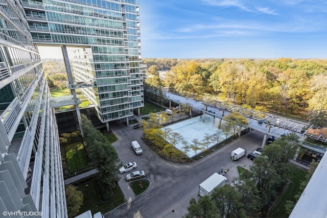 birds eye view of property with a view of city