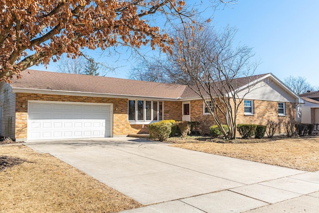 single story home featuring a garage, concrete driveway, brick siding, and a shingled roof