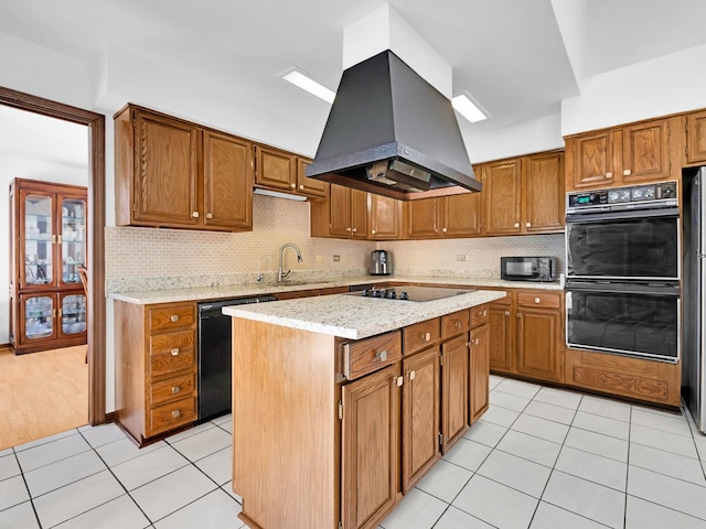 kitchen with a kitchen island, brown cabinets, island exhaust hood, and black appliances