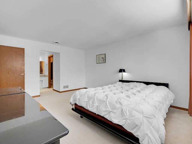 bedroom featuring light carpet, visible vents, and baseboards