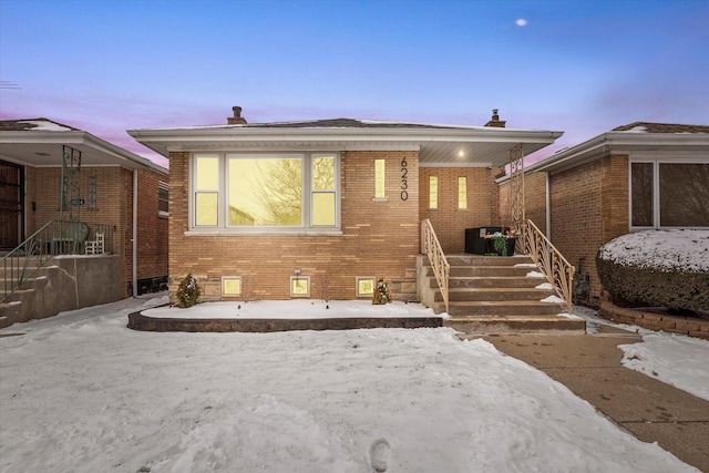 view of front of property with brick siding