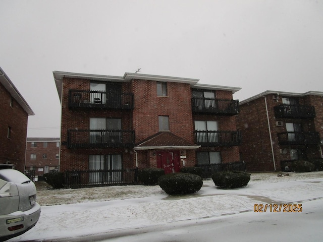 view of snow covered property