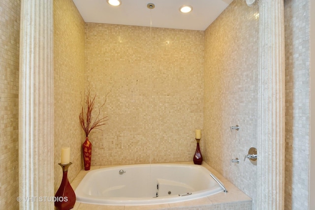 bathroom with a jetted tub